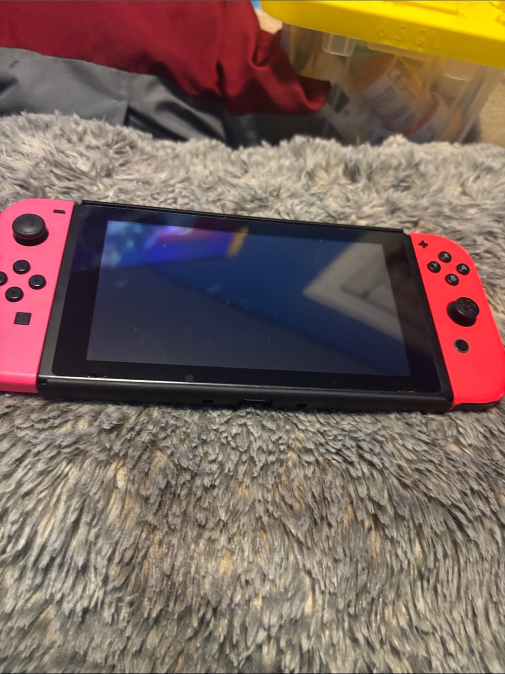 Nintendo Handheld Gaming Console with Pink Joy-Con Controllers